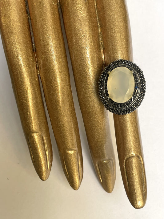 Zircon Double Halo Ring with Oval Center Stone