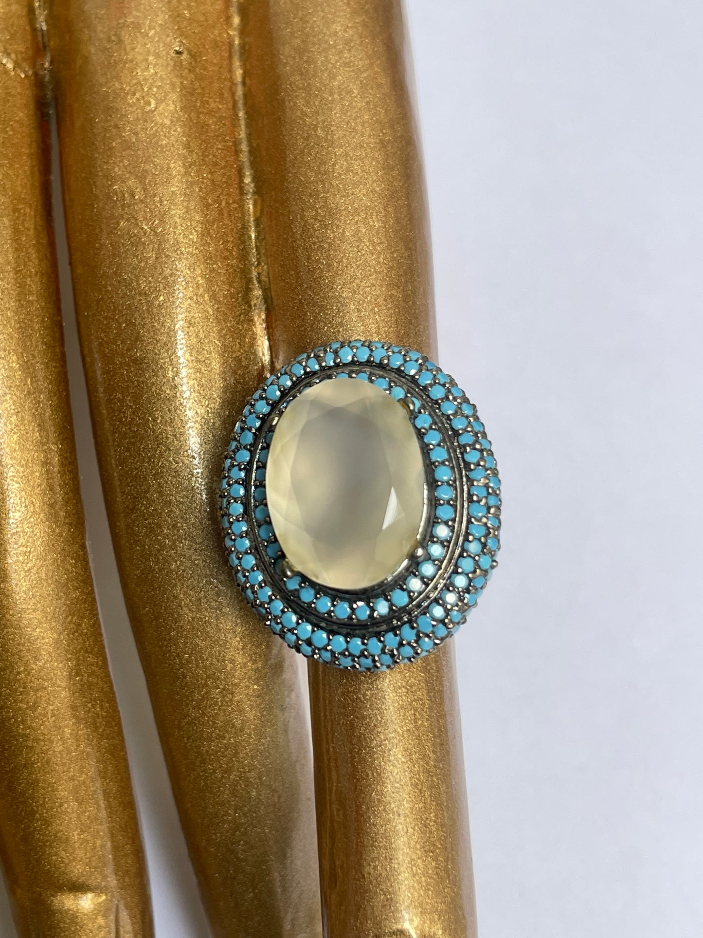 Zircon Double Halo Ring with Oval Center Stone