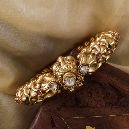 Gold Finish Carved Temple Bangle