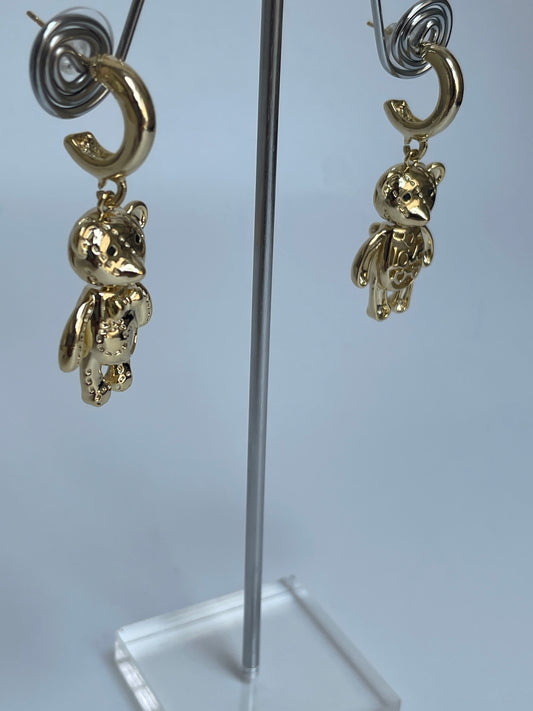 Gold Finish Bear-shaped Dangles earrings on a white background