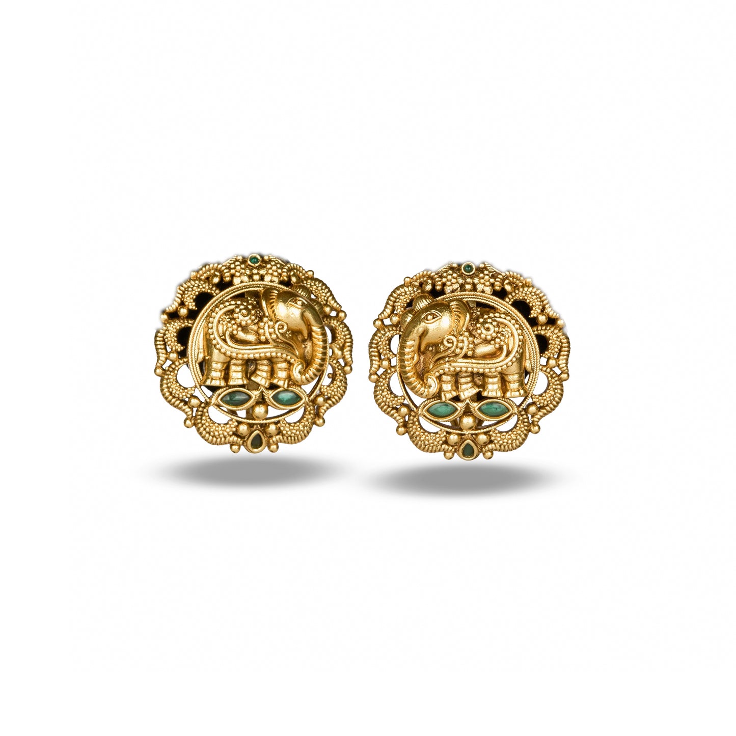 Pair of gold earrings with elephant design on a white background By Studio 6 Jewels