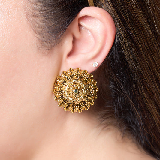 Close Up model Image of a person wearing Gold plated stud earrings