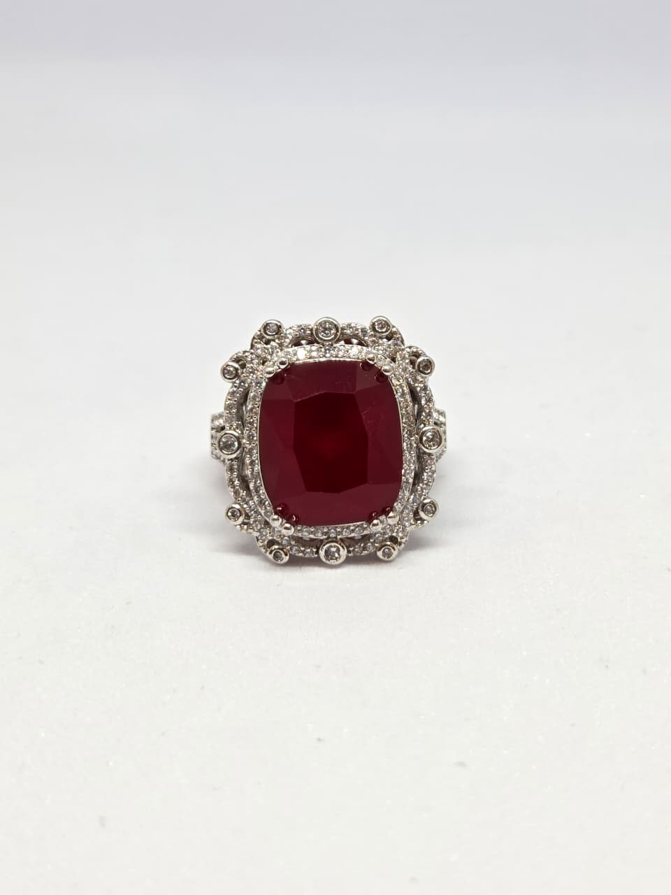 Red Center Stone and Zircon Ring