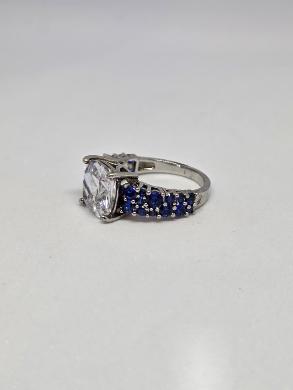 White Finish Solitaire Ring with Colored Stone Details