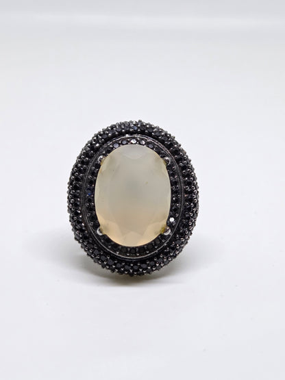 Zircon Double Halo Ring with Oval Center Stone