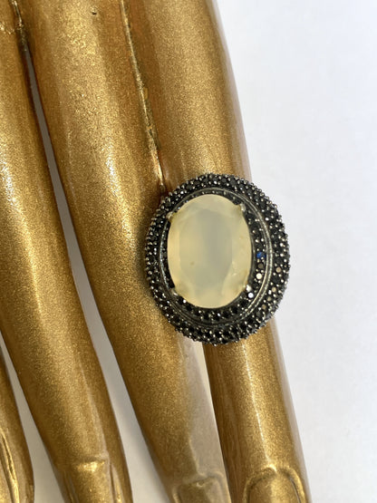 Zircon Double Halo Ring with Oval Center Stone