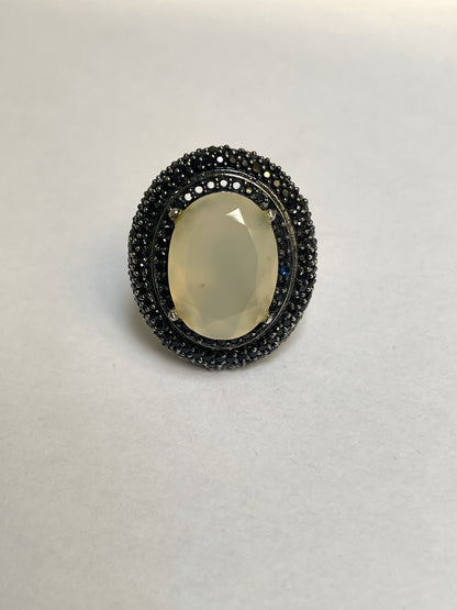 Zircon Double Halo Ring with Oval Center Stone