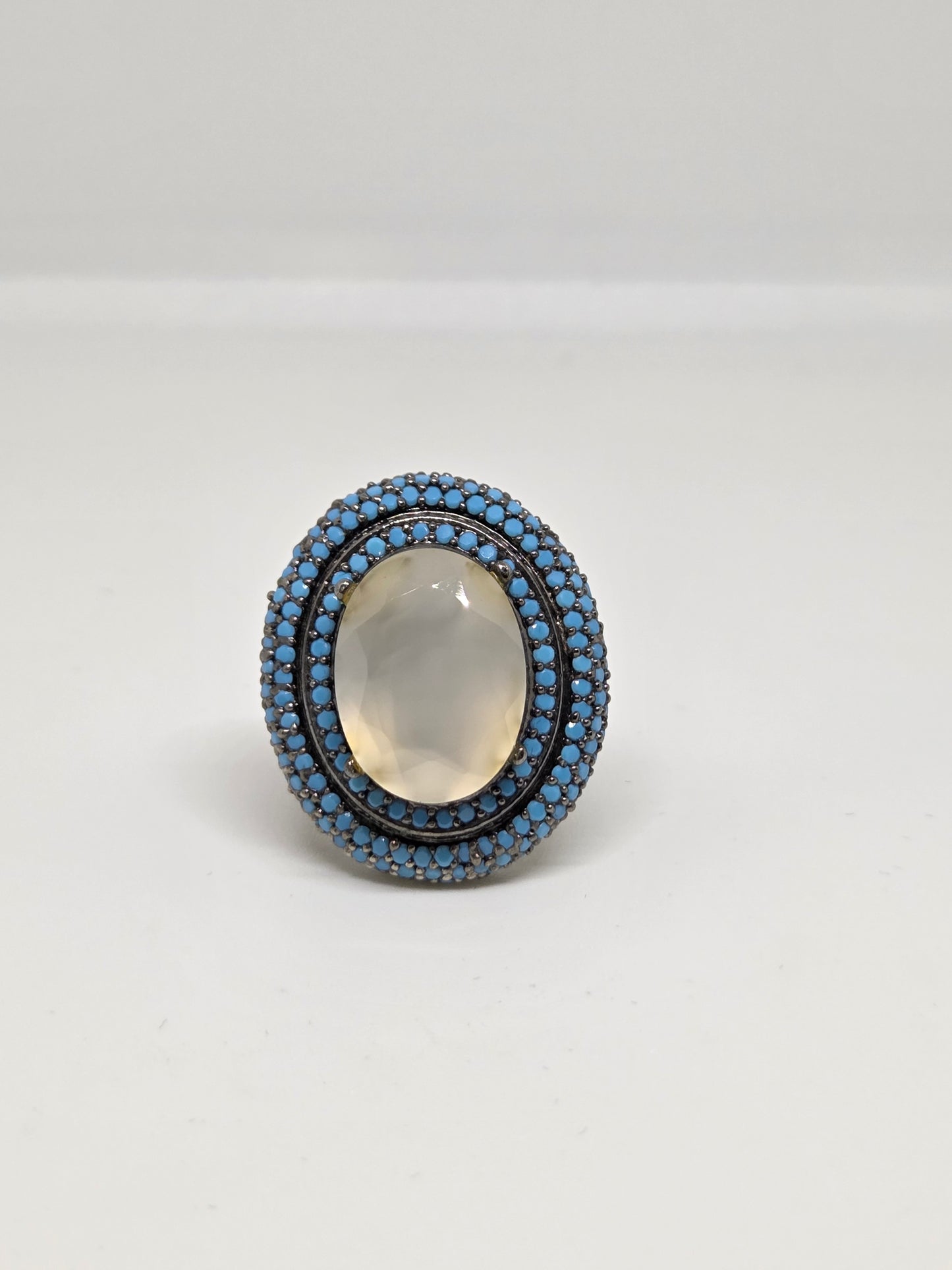 Zircon Double Halo Ring with Oval Center Stone