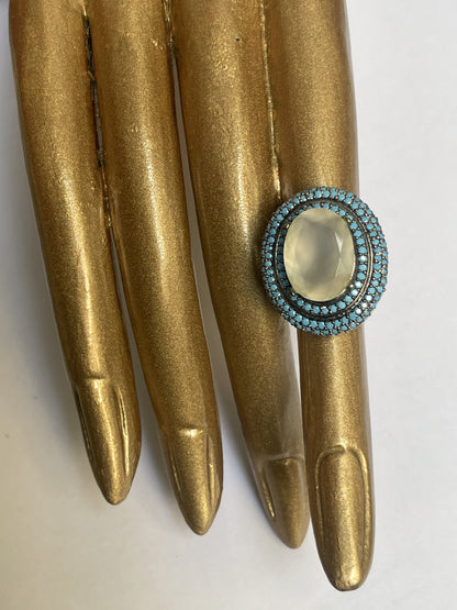 Zircon Double Halo Ring with Oval Center Stone