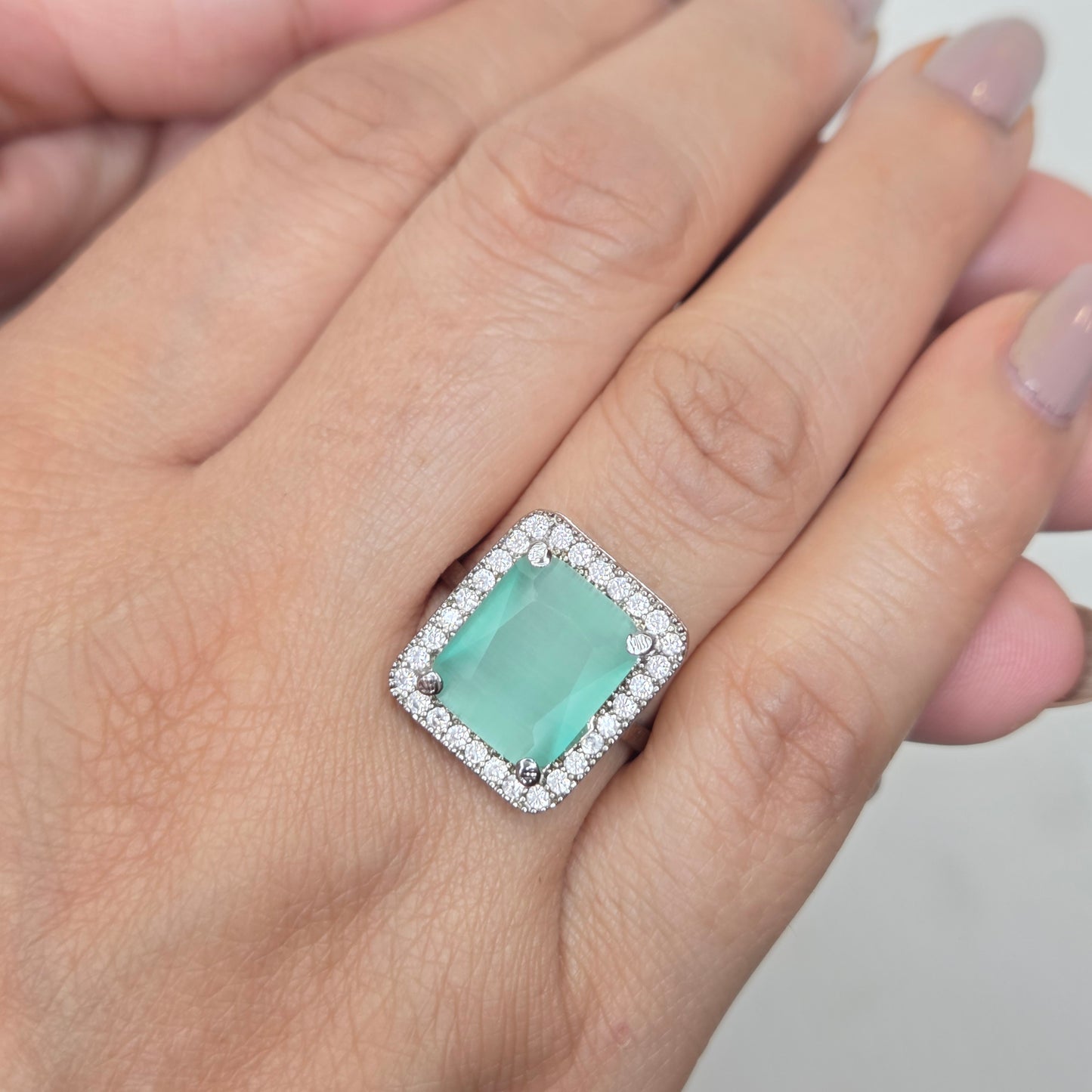 Aqua Zircon Solitaire Halo Ring