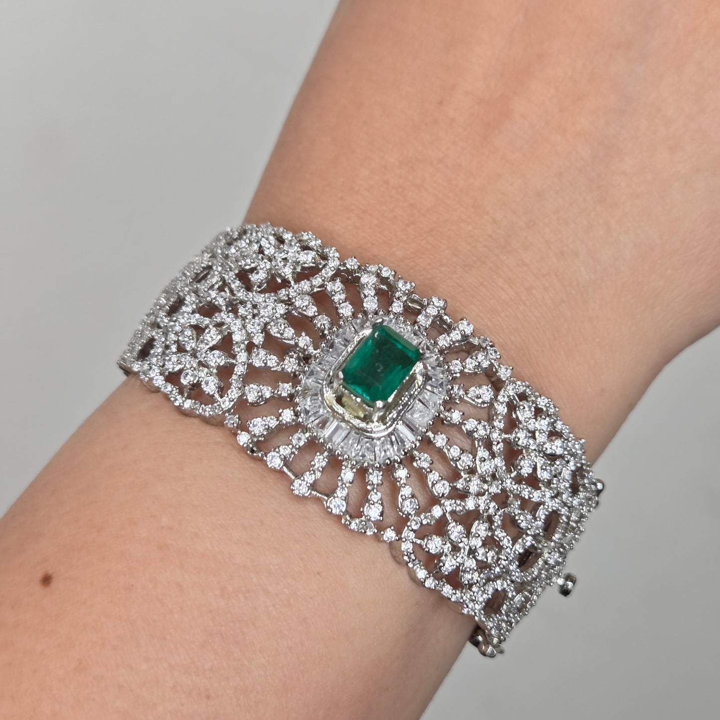 Openable Broad Bracelet With Zircon and Central Synthetic Emerald