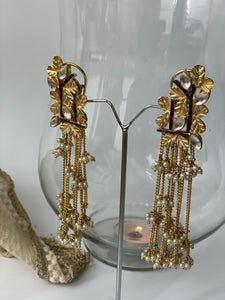 Golden Castle Necklace with Leafy Motifs and Chain Tassels