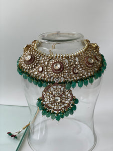 Royal Kundan Bridal Necklace Set with Green Beads and Red Intricate Details