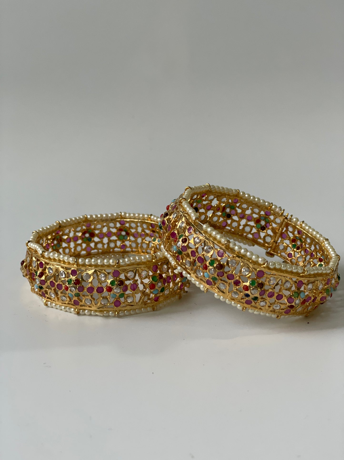 Multi Stone Studded Jadau Pearl Bangles