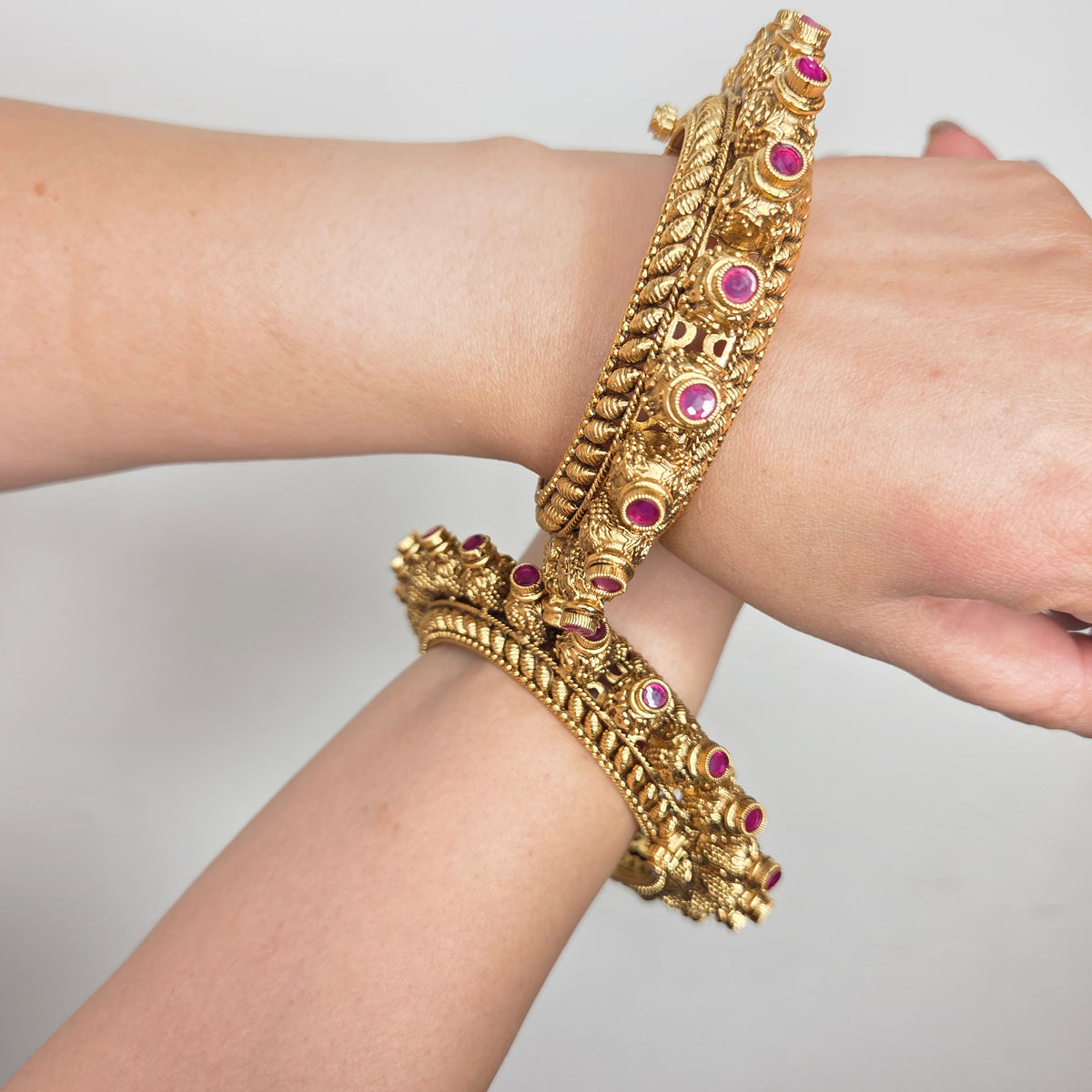 Gold Finish Temple Bangle Set with Ruby and Carved Details