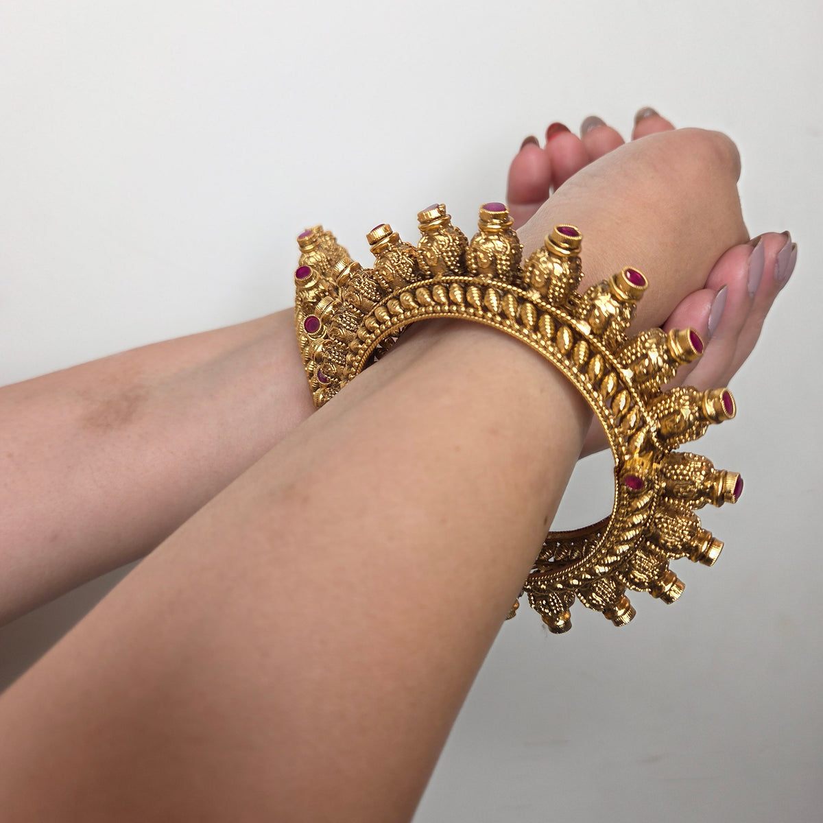 Gold Finish Temple Bangle Set with Ruby and Carved Details
