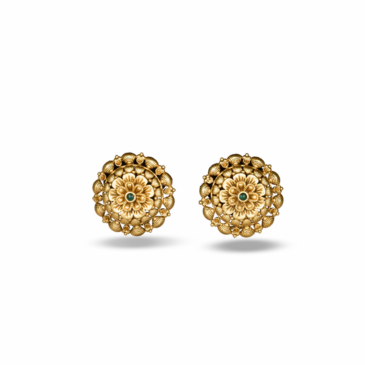 Pair of gold plated  floral earrings with green gemstones on a white background
