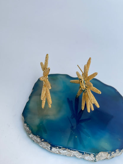 Gold Plated Sun Ray Hoop  Earrings by Studio6jewels on blue stone.