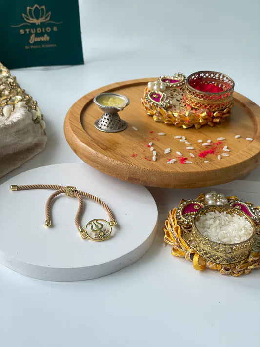 Gold Plated Rope Closure Trishul Bracelet