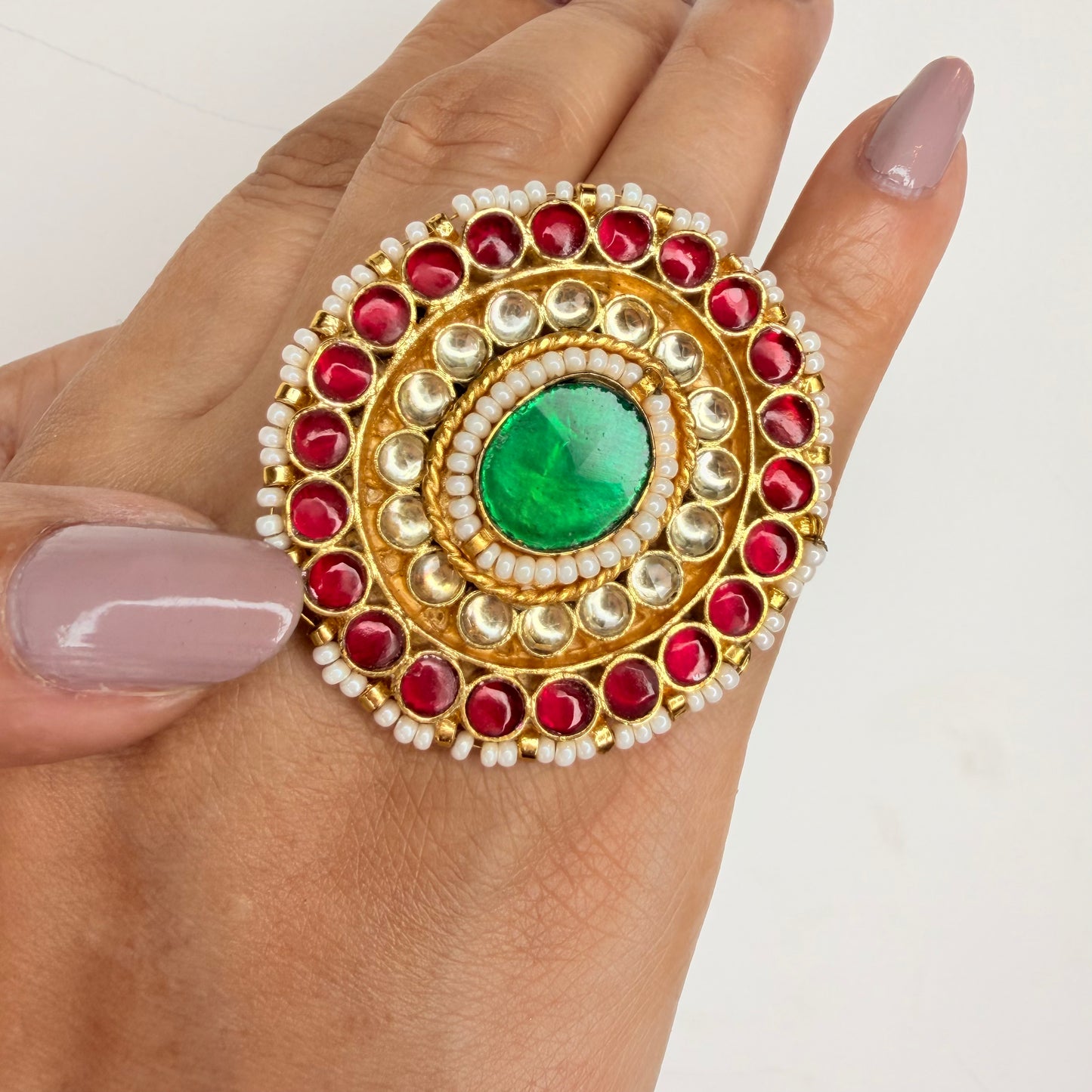Gold Finish Kundan Ring with Red and Green Stones