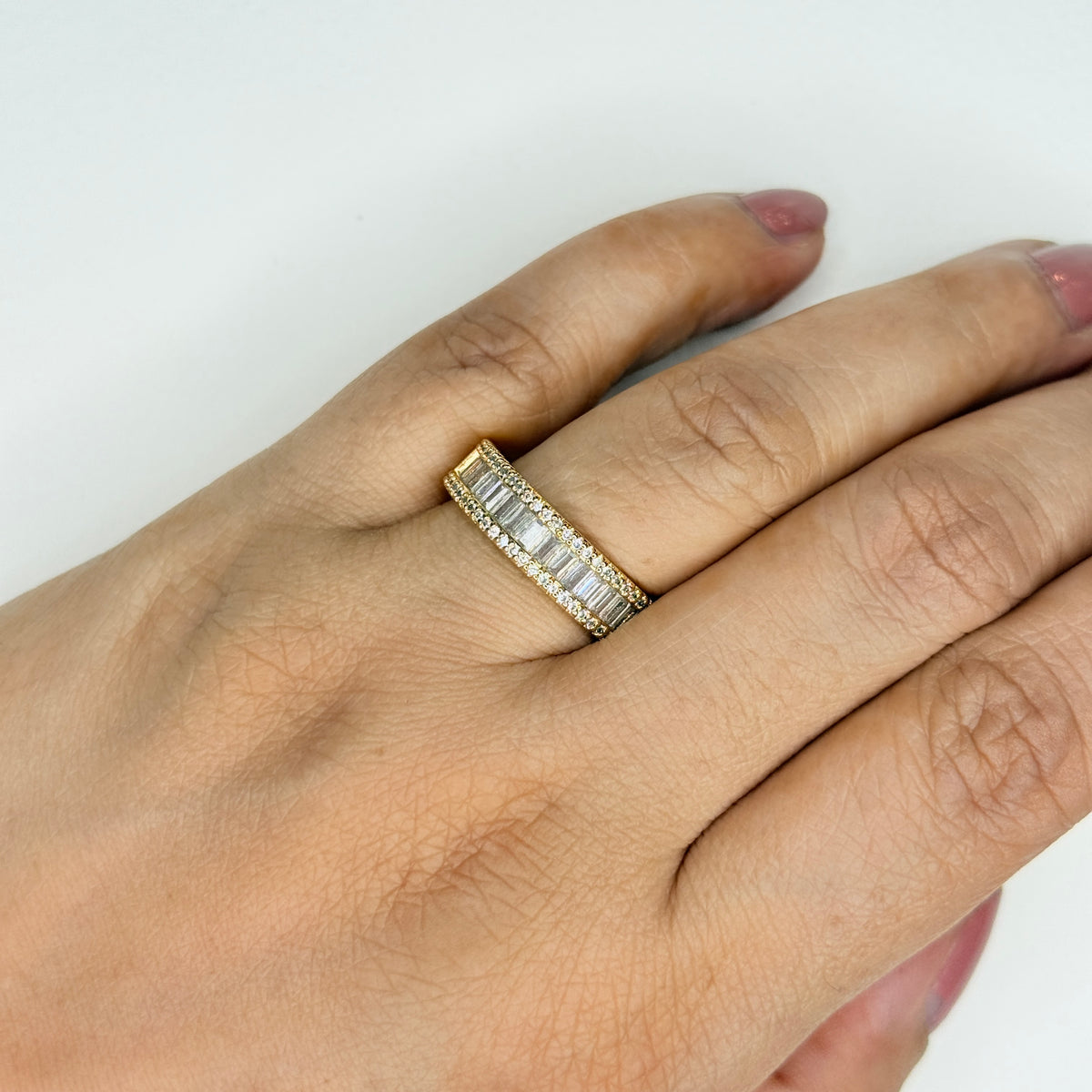 Gold Finish Zircon Studded Ring with Baguette Stones