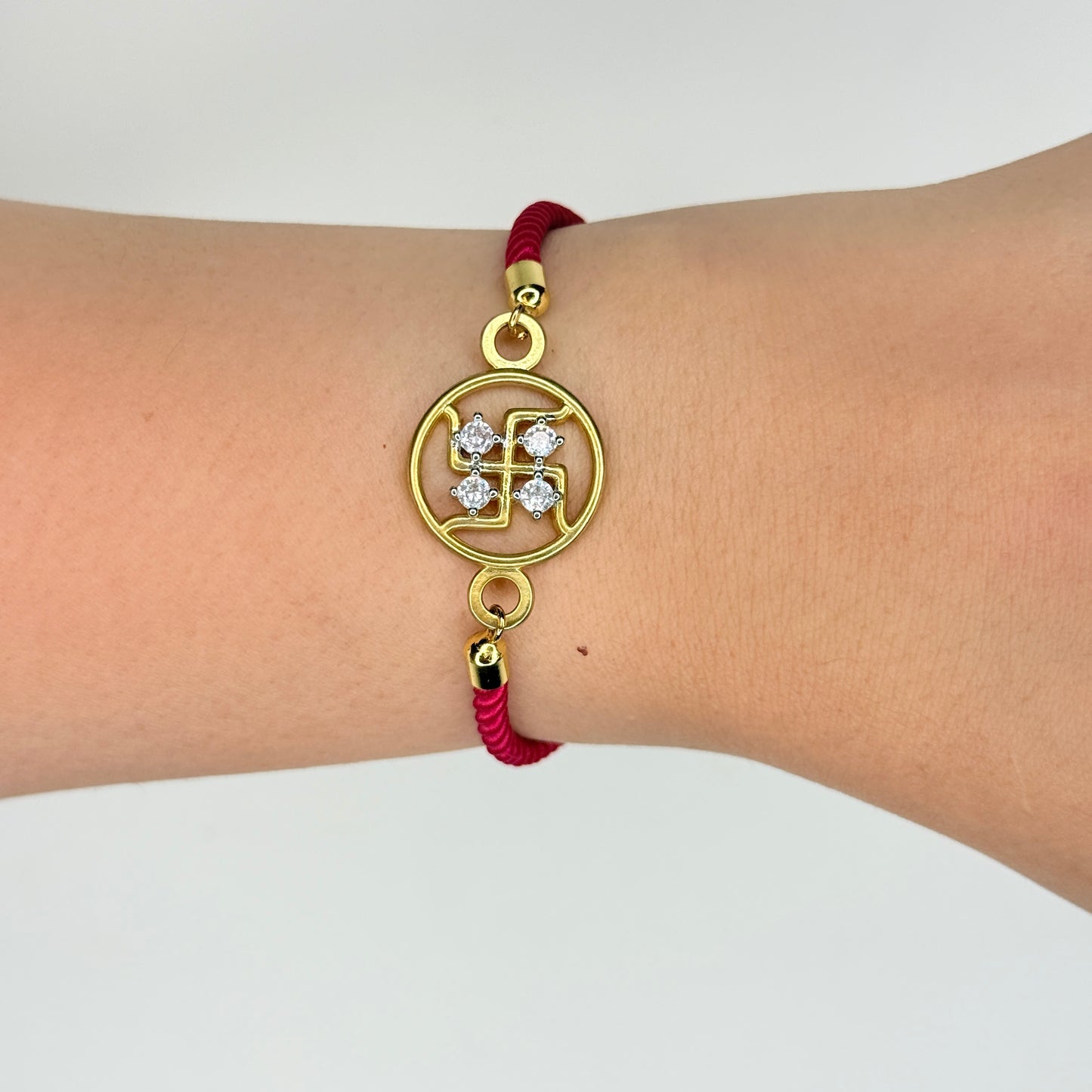 Gold Plated Rope Closure Swastik Bracelet
