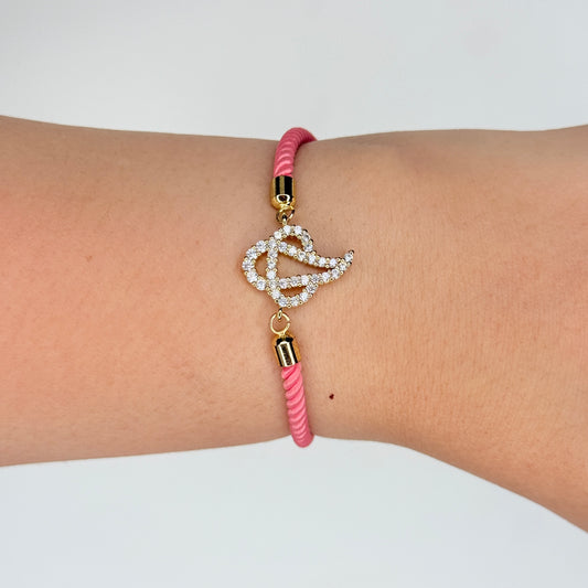 Zircon Lord Ganesh Pink Thread Rakhi