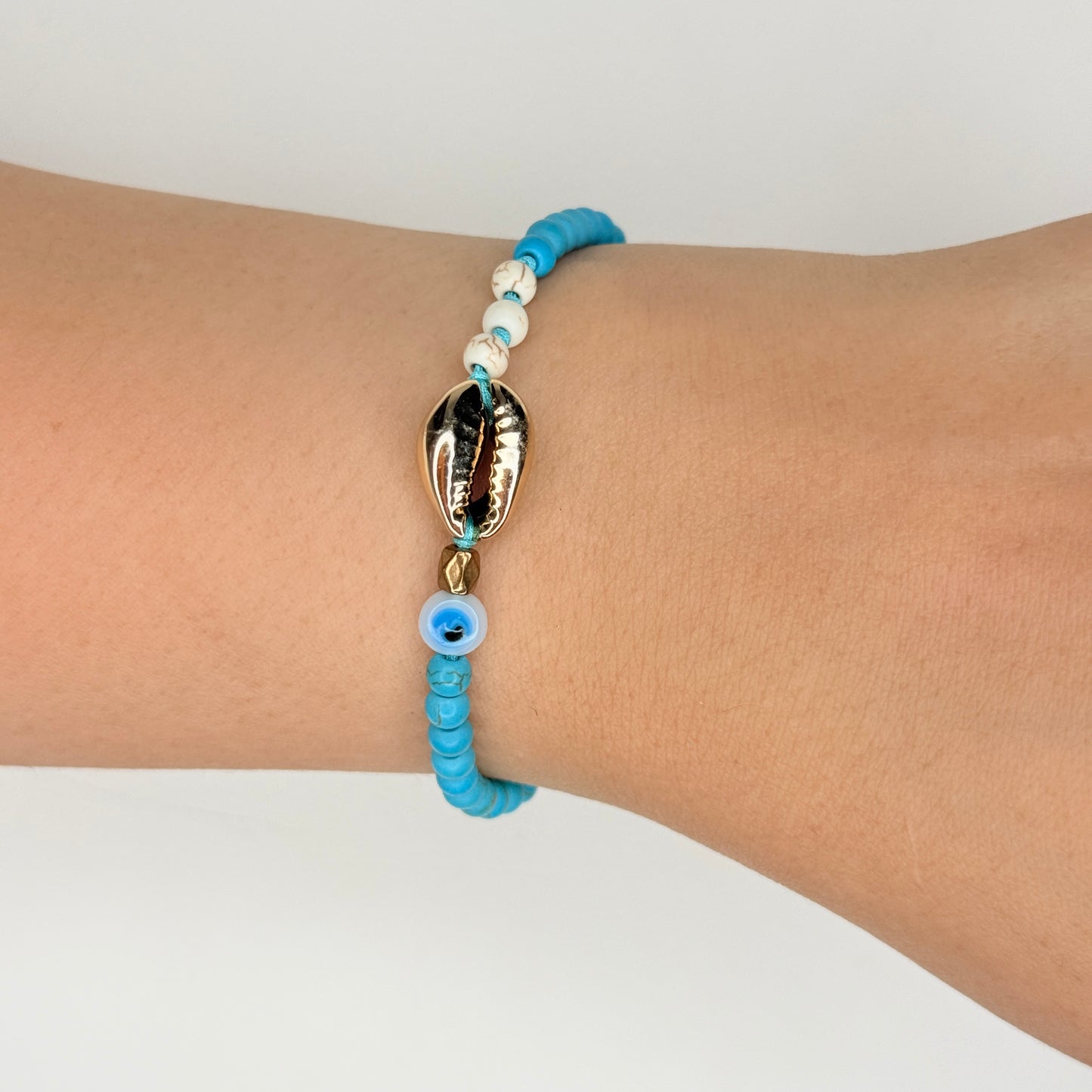 Sea Shell Thread and Beaded Bracelet