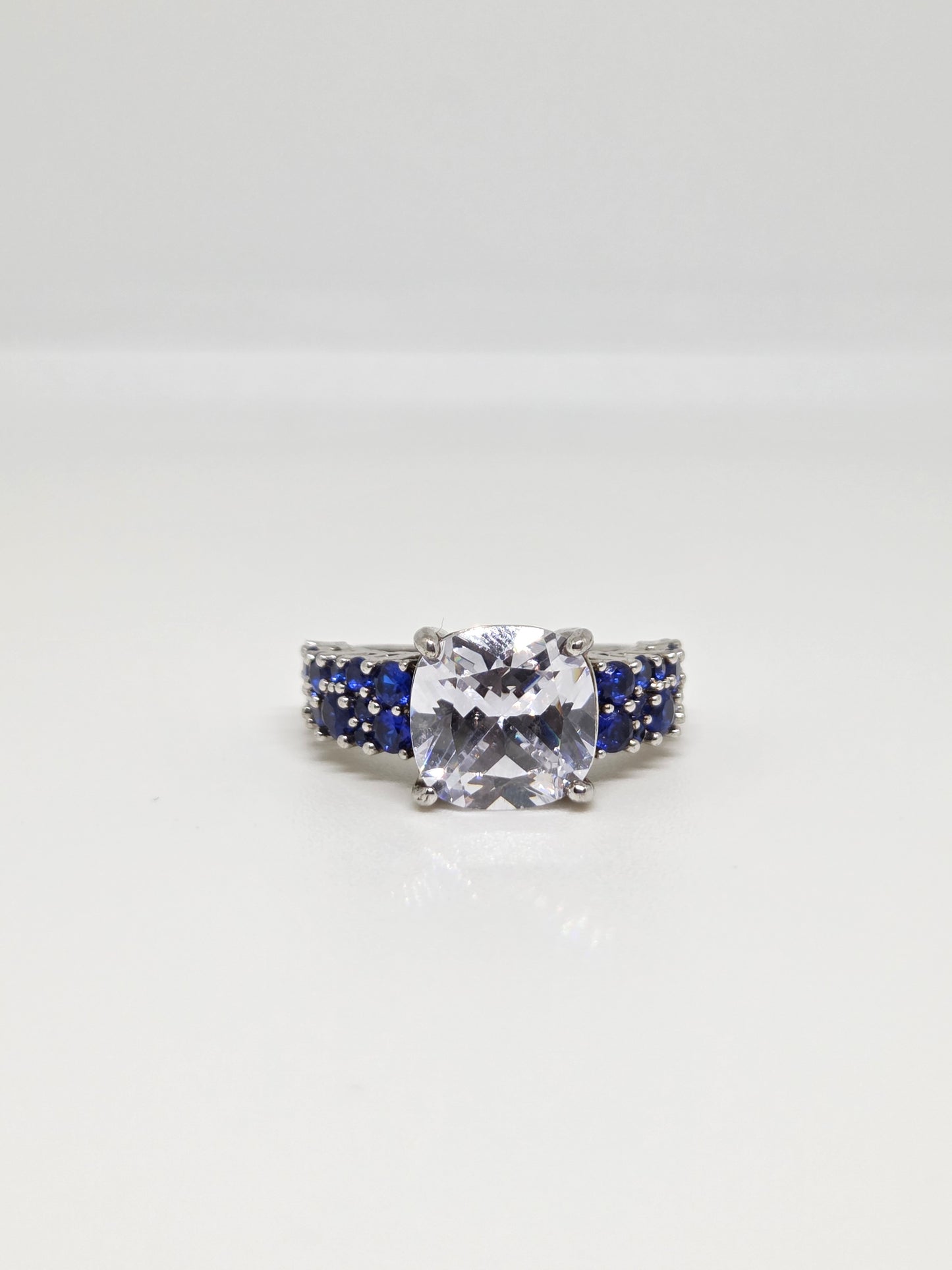 White Finish Solitaire Ring with Colored Stone Details