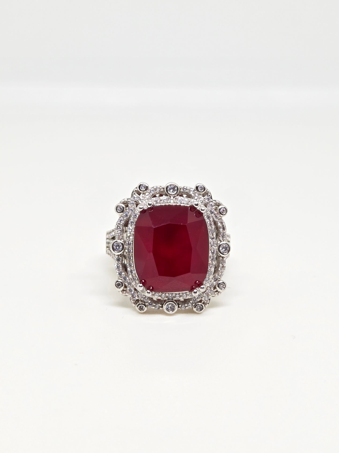 Red Center Stone and Zircon Ring