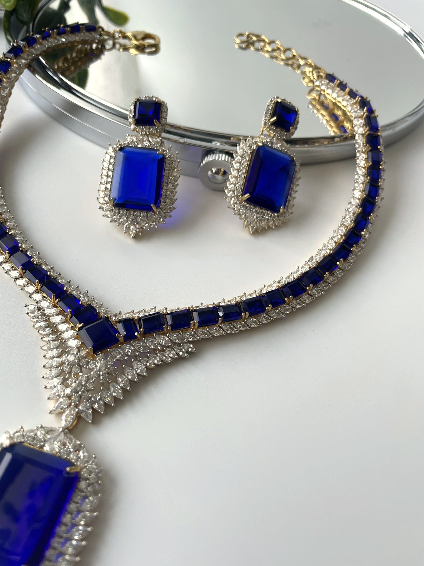 Crystal Doublet Studded Exquisite Necklace Set with Royal Blue Stone