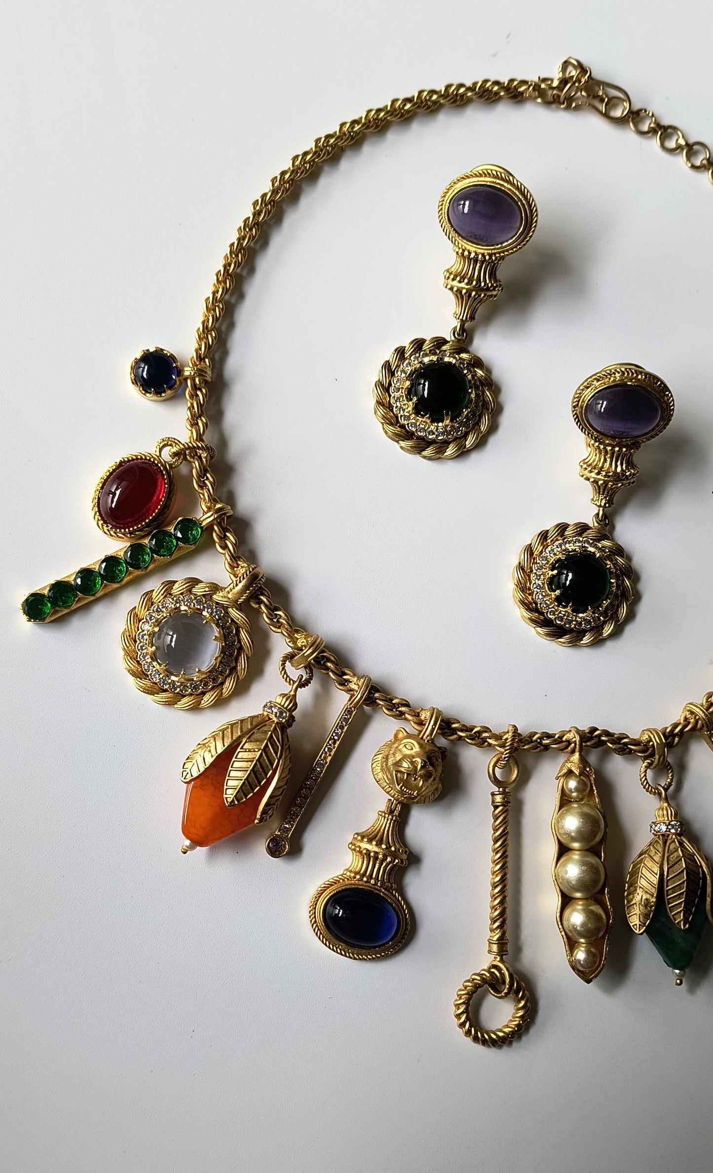 Matte Gold Finish Quirky Necklace Set with Pearls and Multicoloured Stones