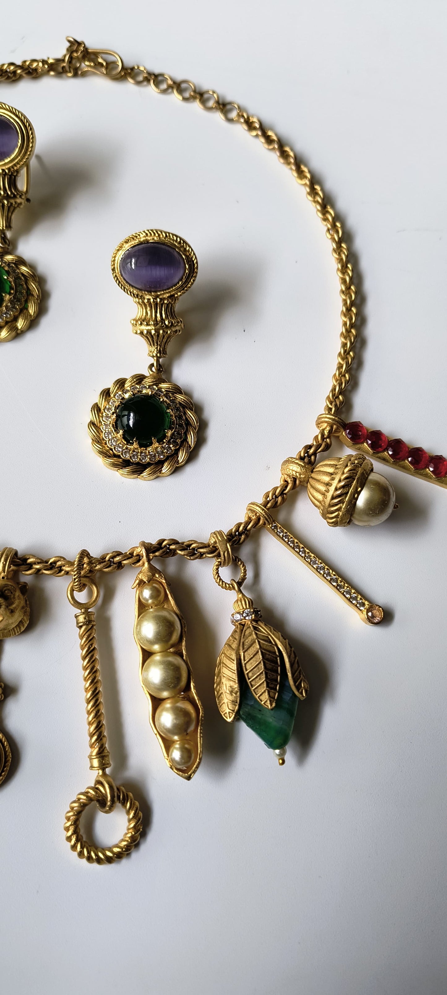 Matte Gold Finish Quirky Necklace Set with Pearls and Multicoloured Stones