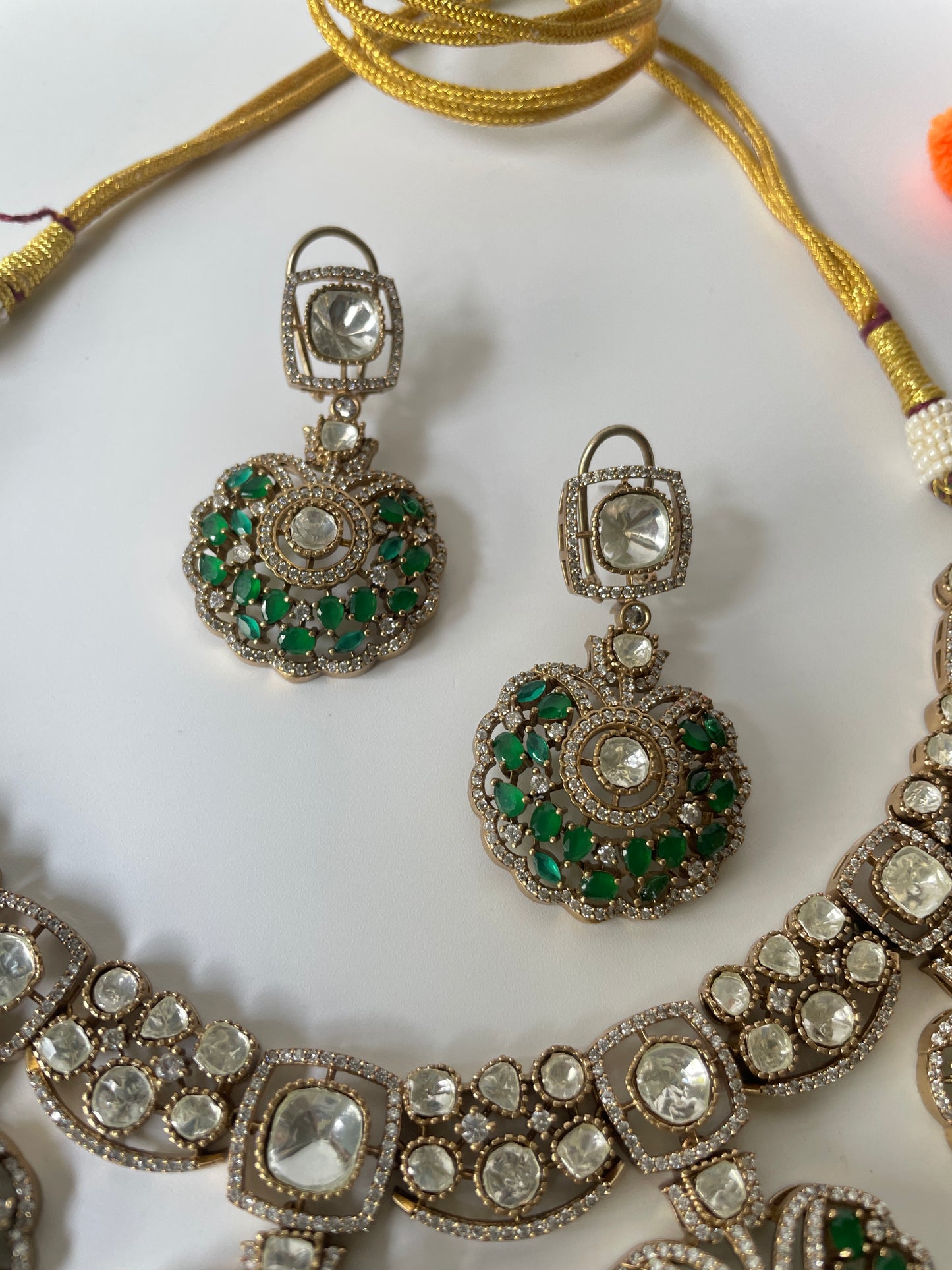 Gold Finish Utsav Necklace Set with Green and White Stone and Miligrain Details