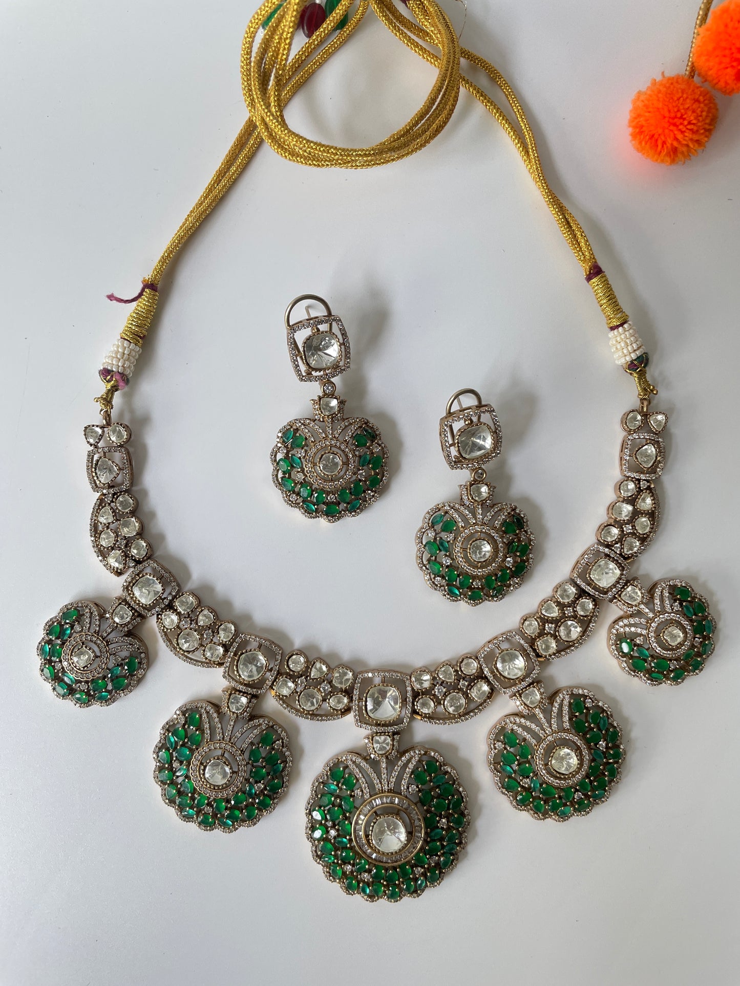 Gold Finish Utsav Necklace Set with Green and White Stone and Miligrain Details