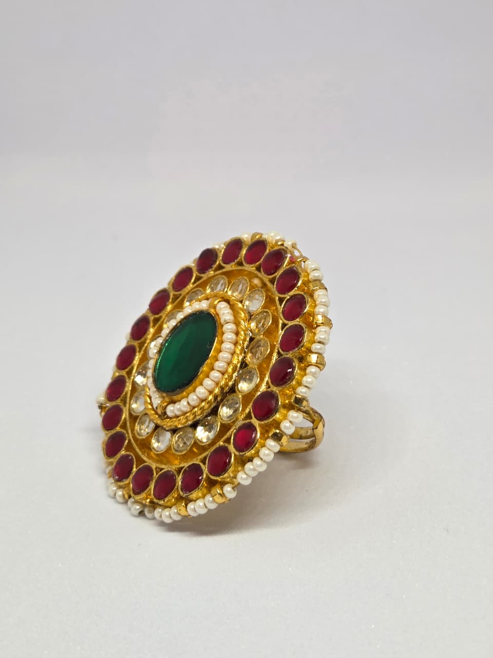 Gold Finish Kundan Ring with Red and Green Stones