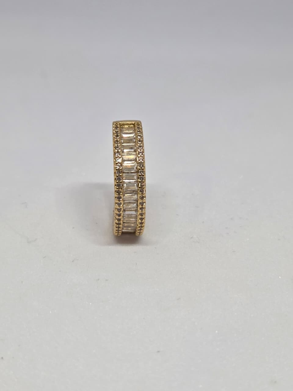 Gold Finish Zircon Studded Ring with Baguette Stones