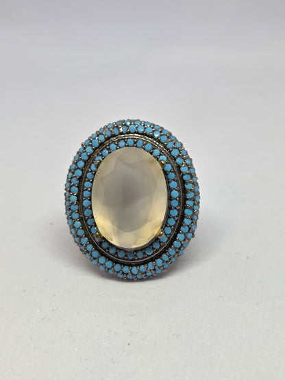 Zircon Double Halo Ring with Oval Center Stone