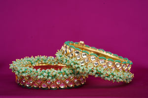 Kundan bangles with Mini green beads
