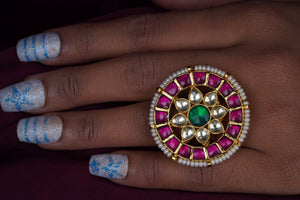 Kundan ring in pink color on gold polish
